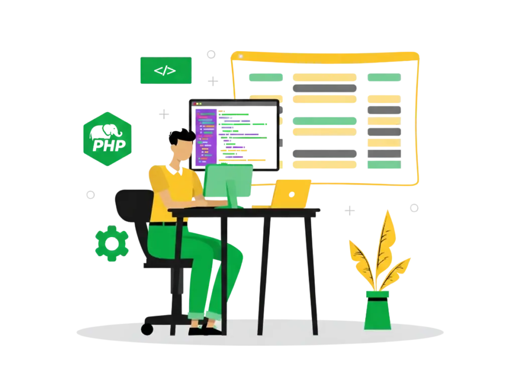 A student sitting at a desk and coding on a computer in a PHP course in Vadodara